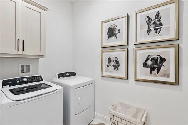 a view of hallway with washer and dryer