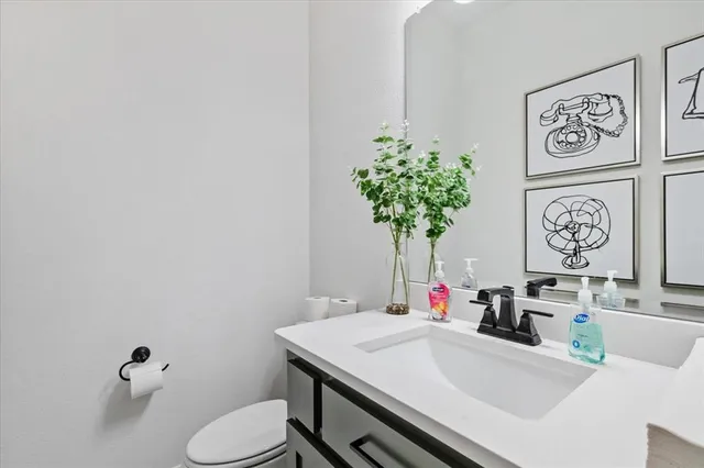 a bathroom with a sink and a toilet