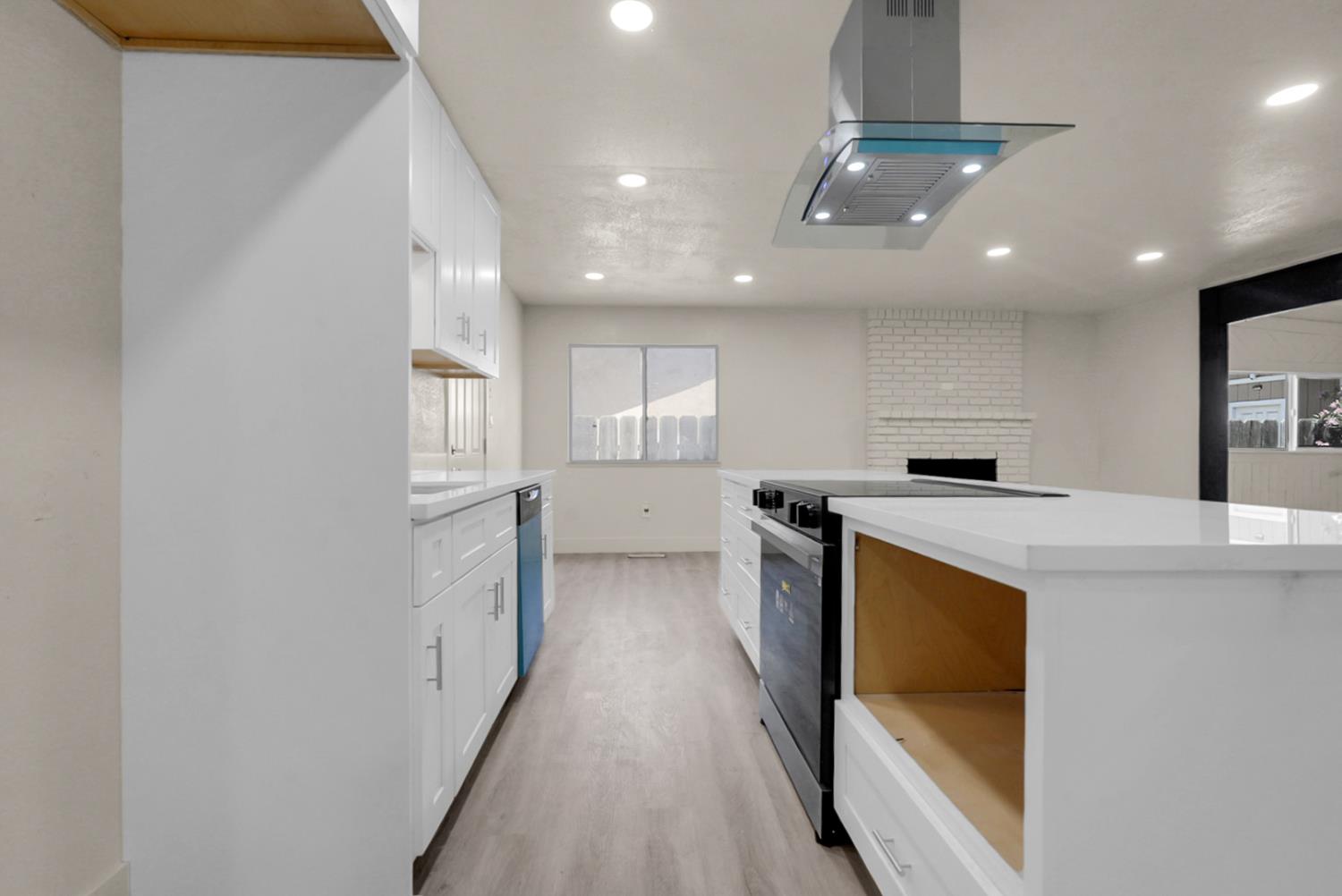 2832 Fowler Road Ceres, CA 95307 - Photo 4 of 28 a kitchen with a refrigerator and a sink