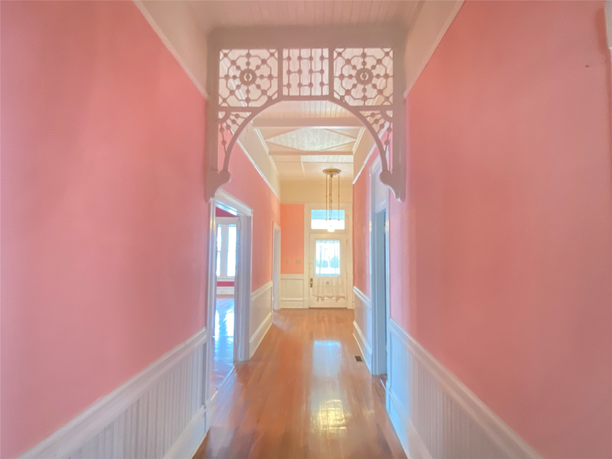 223 East Robert Toombs Avenue Washington, GA 30673 - Photo 12 of 46 a view of a hallway with entryway wooden floor and front door