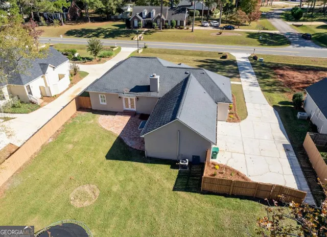 a view of a swimming pool with a lake