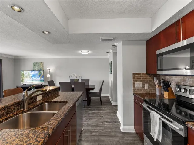 a front view of a house with garage