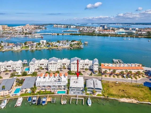 a view of residential houses with outdoor space lake view and houses view