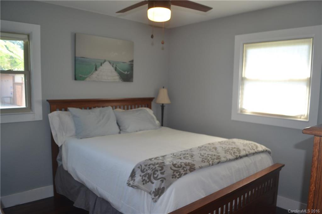 3233 Smith Farm Road Matthews, NC 28104 - Photo 13 of 23 a bedroom with a bed and window