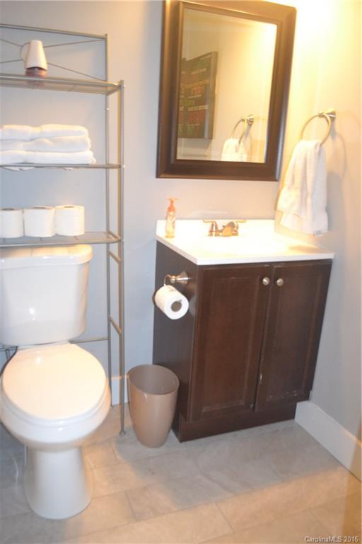 3233 Smith Farm Road Matthews, NC 28104 - Photo 15 of 23 a bathroom with a toilet and a sink