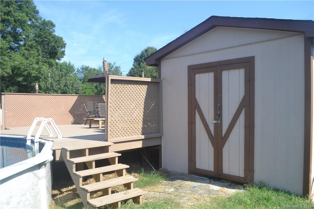 3233 Smith Farm Road Matthews, NC 28104 - Photo 23 of 23 a backyard of a house with seating space