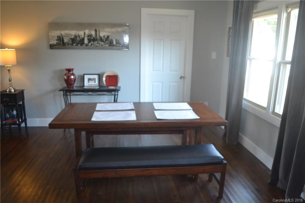 3233 Smith Farm Road Matthews, NC 28104 - Photo 4 of 23 a view of a workspace with furniture and wooden floor