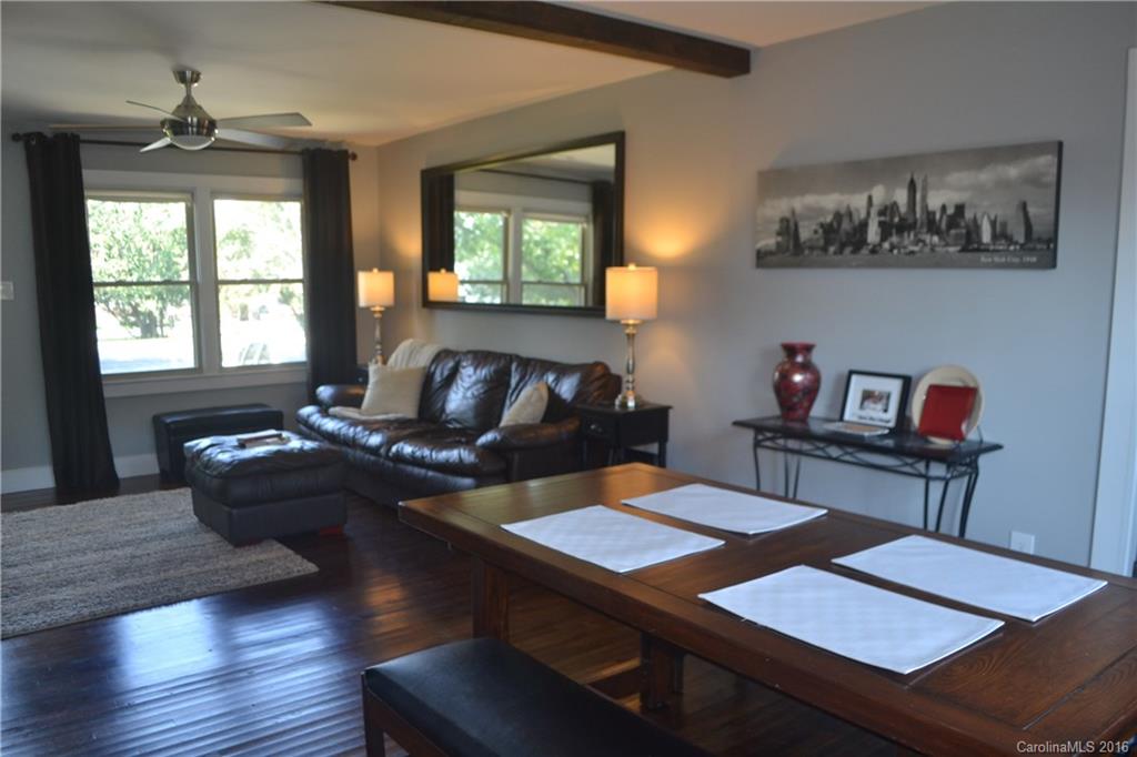 3233 Smith Farm Road Matthews, NC 28104 - Photo 7 of 23 a living room with furniture and a table