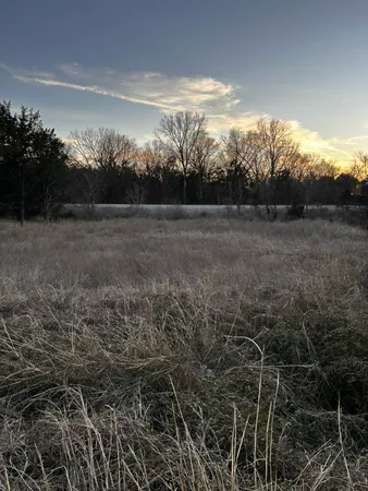 a view of outdoor space with deck and yard
