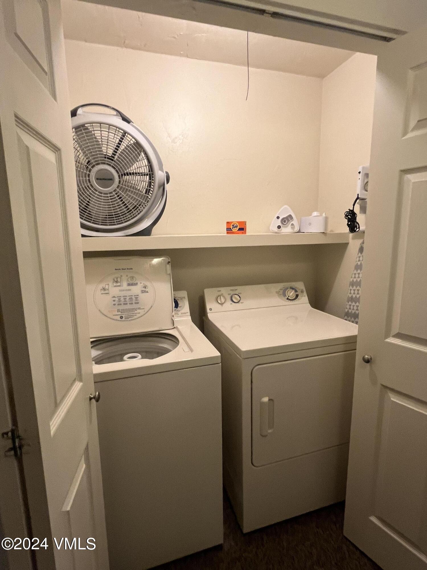 1020 Vail View Drive, Unit 230833 Vail, CO 81657 - Photo 20 of 20 a utility room with dryer and washer