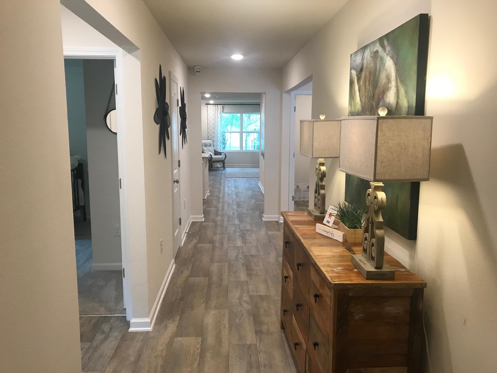3543 Sugar Maple Lane Crestview, FL 32539 - Photo 3 of 20 a view of hallway with wooden floor