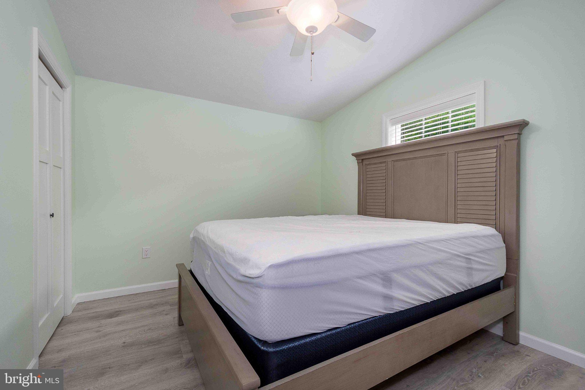 511 Hill Top Road Oakland, MD 21550 - Photo 30 of 51 Serene bedroom with soft green hues.