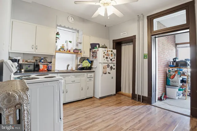 a view of a door and a window