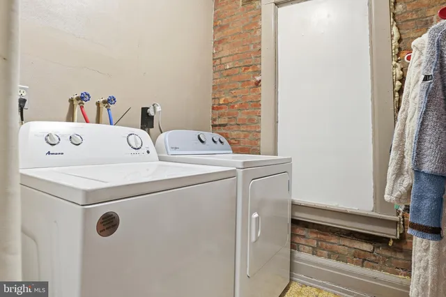 a view of a bathroom from a hallway