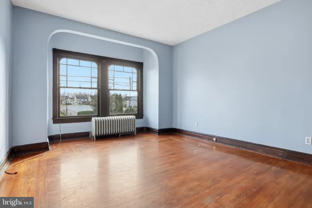 a view of kitchen with stainless steel appliances a refrigerator and a stove top oven