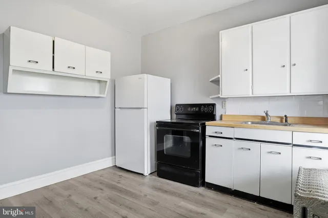 a bathroom with a bathtub and a sink