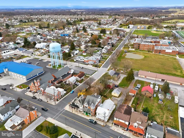 an aerial view of a building with outdoor space