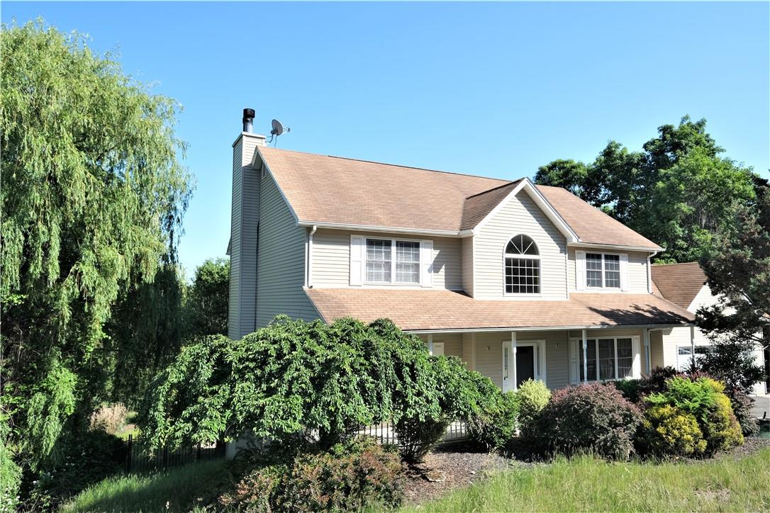 12 Hawk Nest Road Tomkins Cove, NY 10986 - Photo 1 of 1 a view of a white house with a yard and potted plants