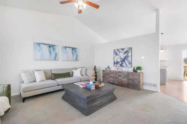 a living room with furniture and a couch