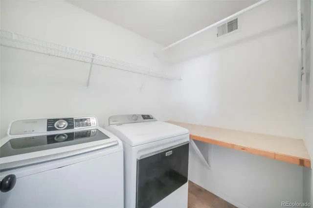 an aerial view of a house with a lake view