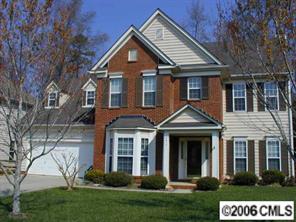 6617 Reedy Creek Road Charlotte, NC 28215 - Photo 1 of 8 a front view of a house with a yard