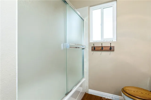 a view of a backyard with sitting area