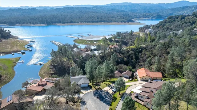 an aerial view of lake and mountain view