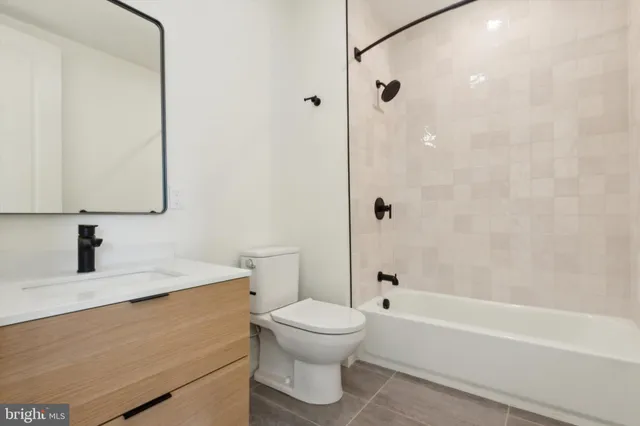 a view of an empty room with glass door