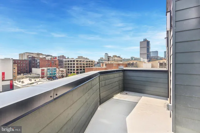 a view of a hallway with white walls