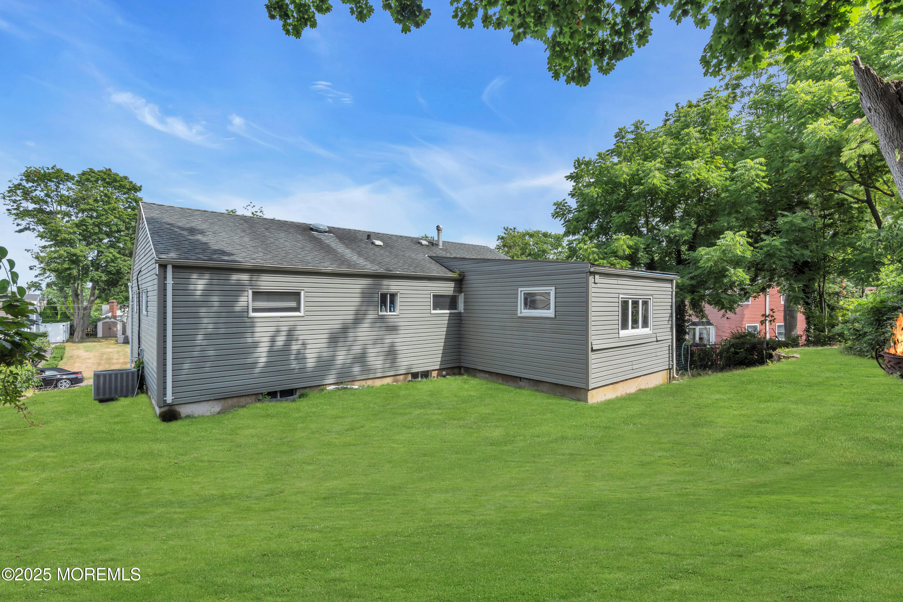 988 Elizabeth Terrace Long Branch, NJ 07740 - Photo 7 of 16 a view of a house with a yard