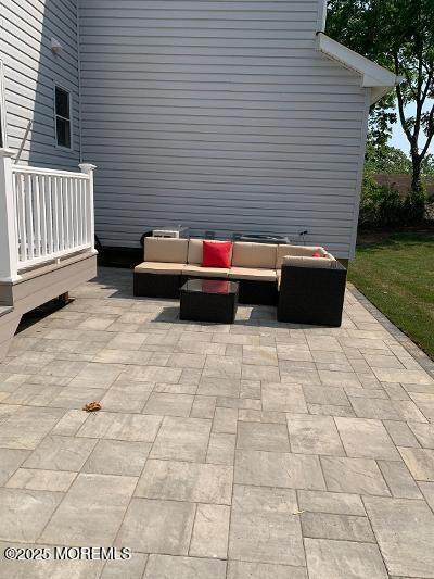 988 Elizabeth Terrace Long Branch, NJ 07740 - Photo 8 of 16 a view of a terrace with a bench