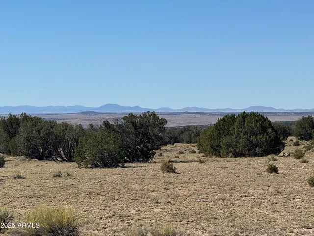 a view of ocean and mountain