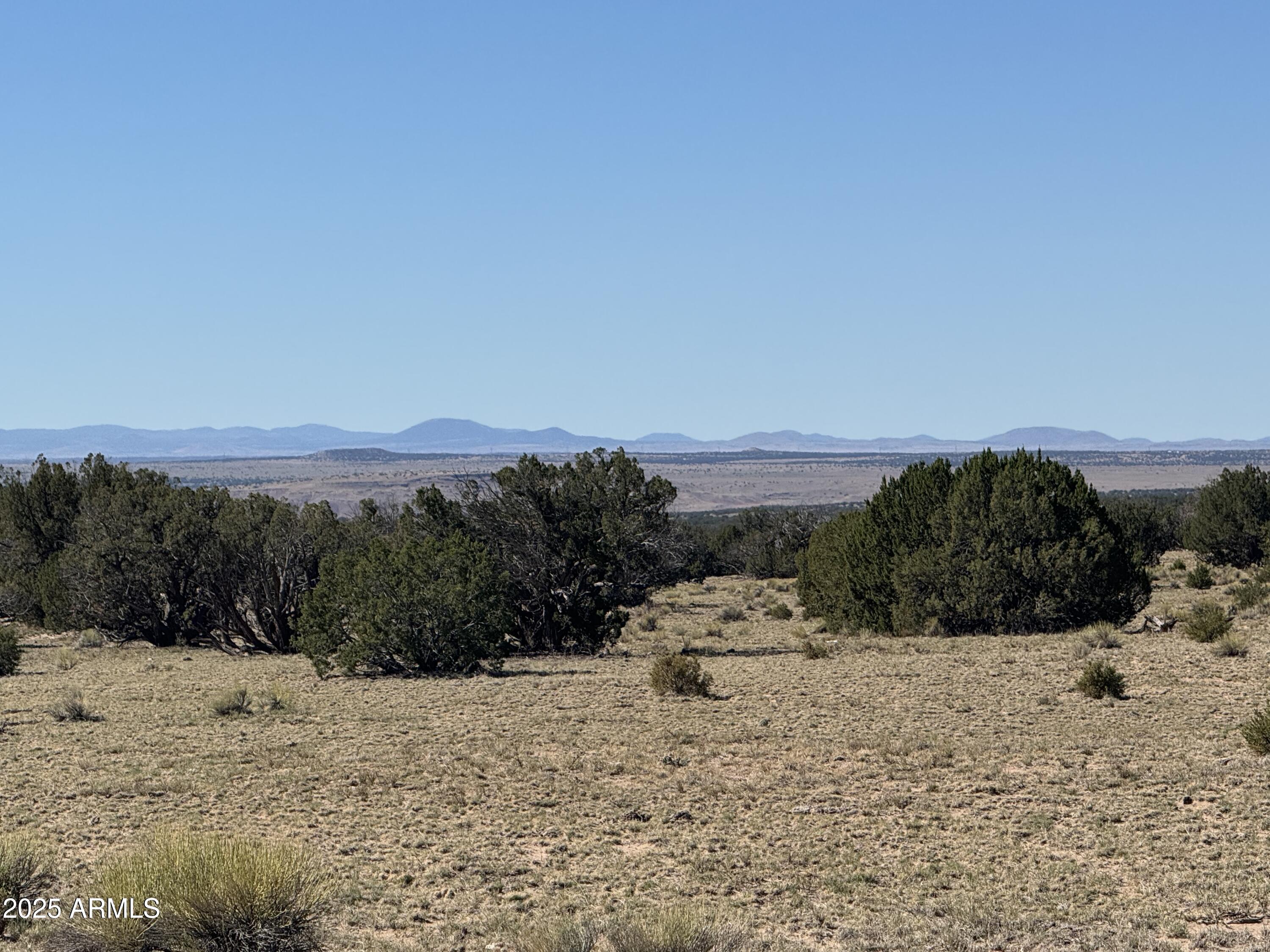 a view of ocean and mountain