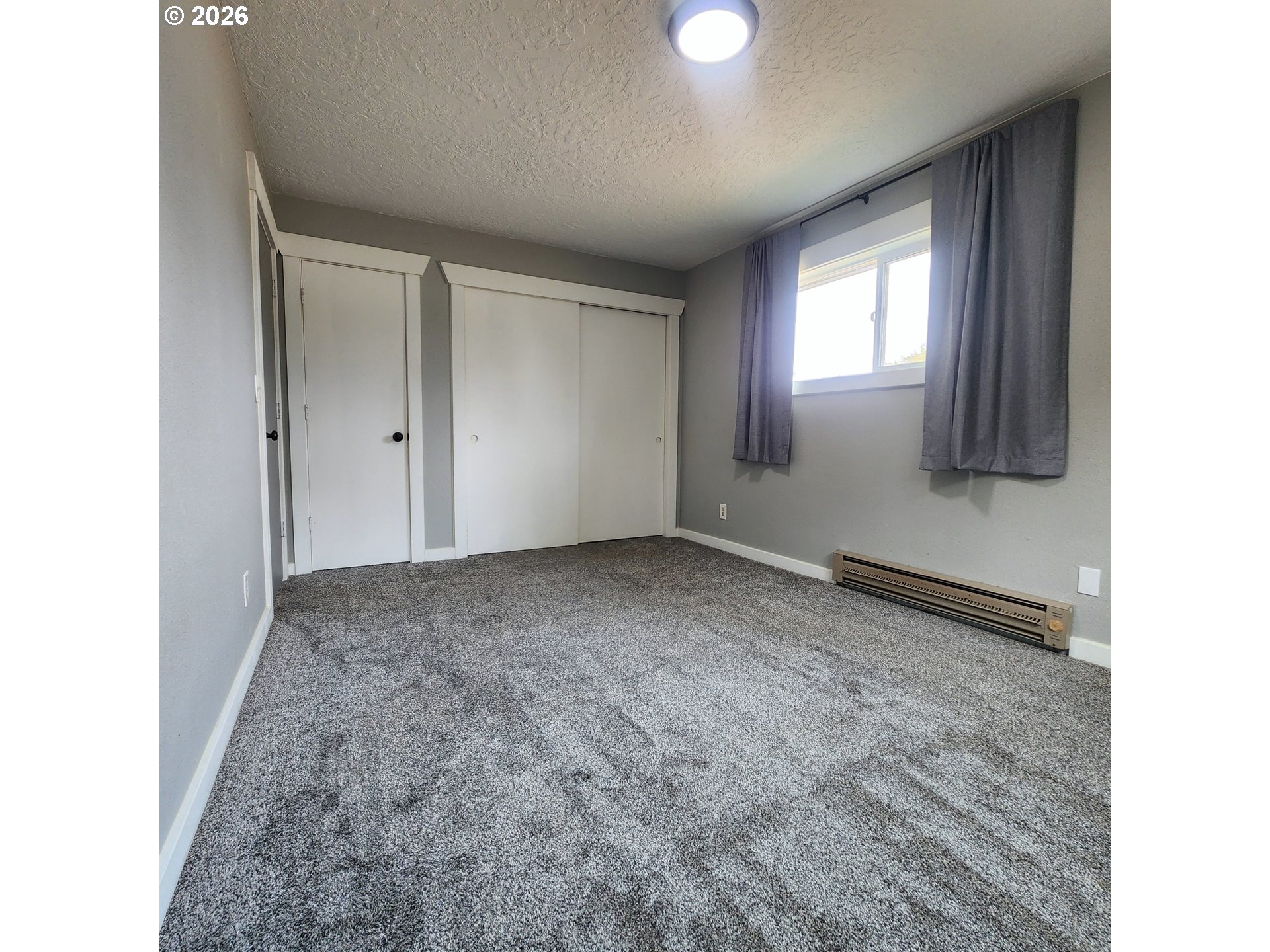 54047 West Lane Road Scappoose, OR 97056 - Photo 11 of 44 a view of an empty room and window