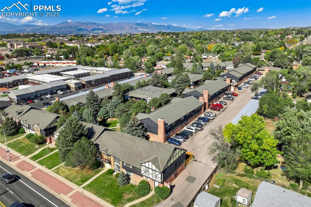 2902 Airport Road, Unit 116 Colorado Springs, CO 80910 - Photo 22 of 32 an aerial view of residential houses with outdoor space