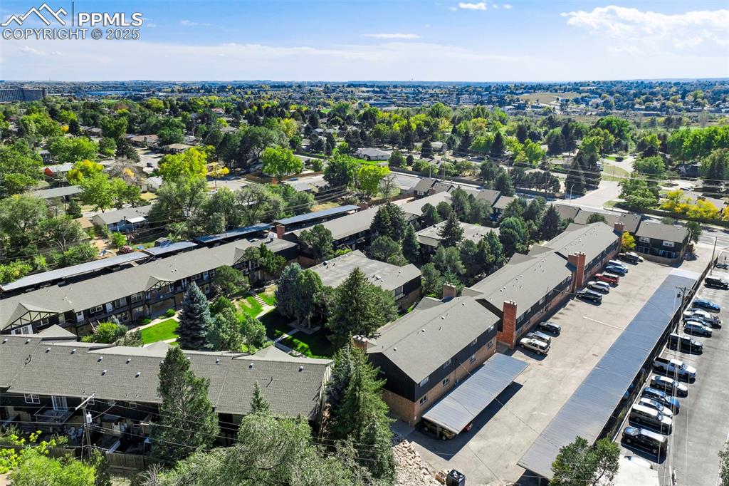 2902 Airport Road, Unit 116 Colorado Springs, CO 80910 - Photo 29 of 32 an aerial view of a house with a garden