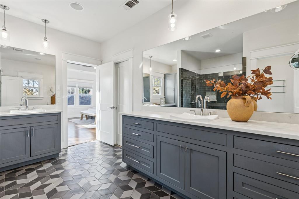5938 Goliad Avenue Dallas, TX 75206 - Photo 16 of 34 Primary bath with dual sinks, vanities and walk-in closets