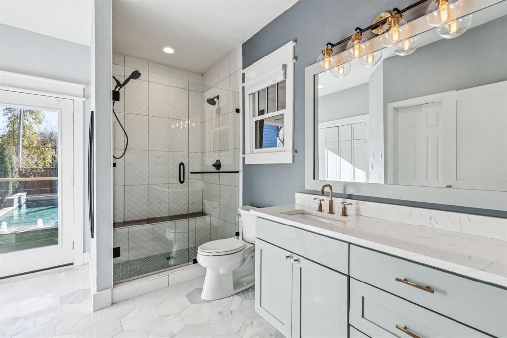 5938 Goliad Avenue Dallas, TX 75206 - Photo 21 of 34 1st floor primary bath also offers secondary laundry and pool bath