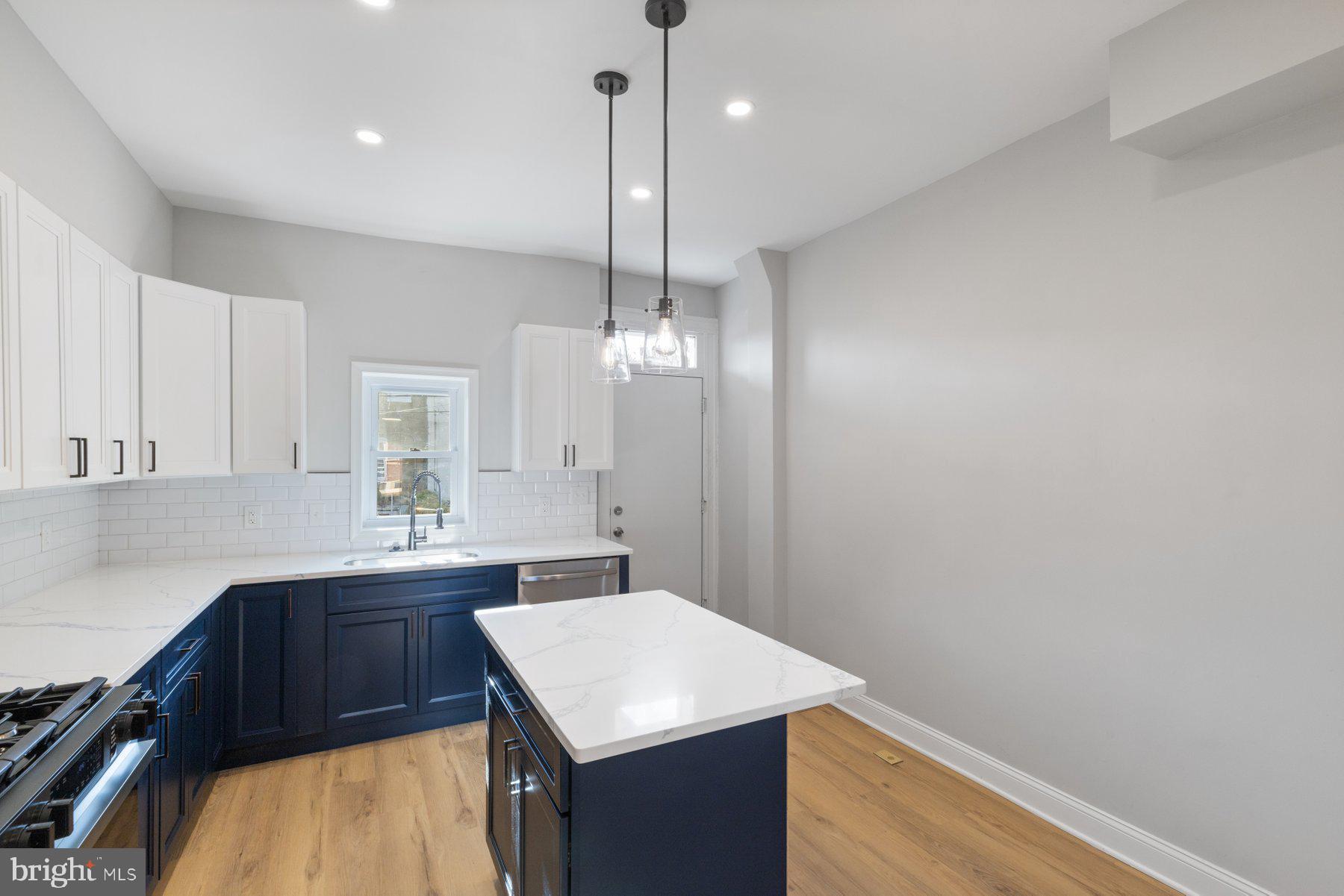 653 Bartlett Avenue Baltimore, MD 21218 - Photo 10 of 39 Large kitchen island