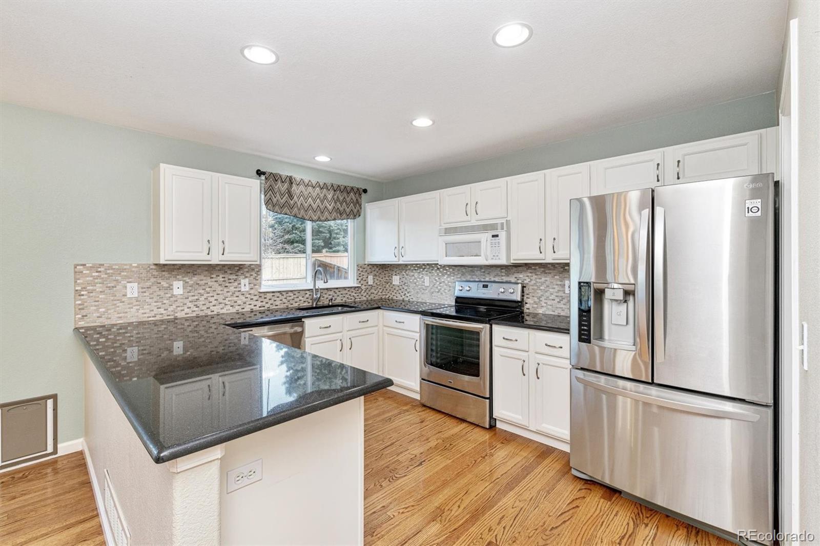 9762 Saybrook Street Highlands Ranch, CO 80126 - Photo 3 of 28 Gallery Image 3