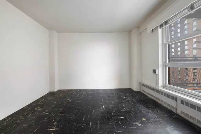 a kitchen that has a sink and a stove