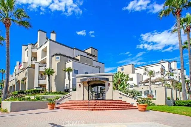 a view of a building with a yard