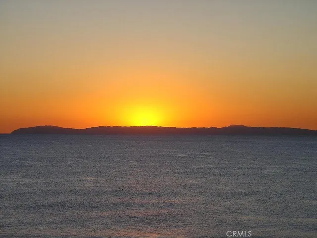 a view of swimming pool with outdoor seating