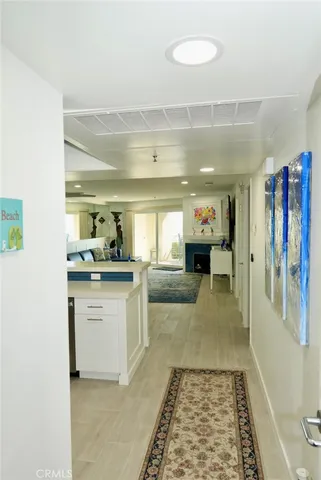 a kitchen with stainless steel appliances granite countertop a refrigerator and stove