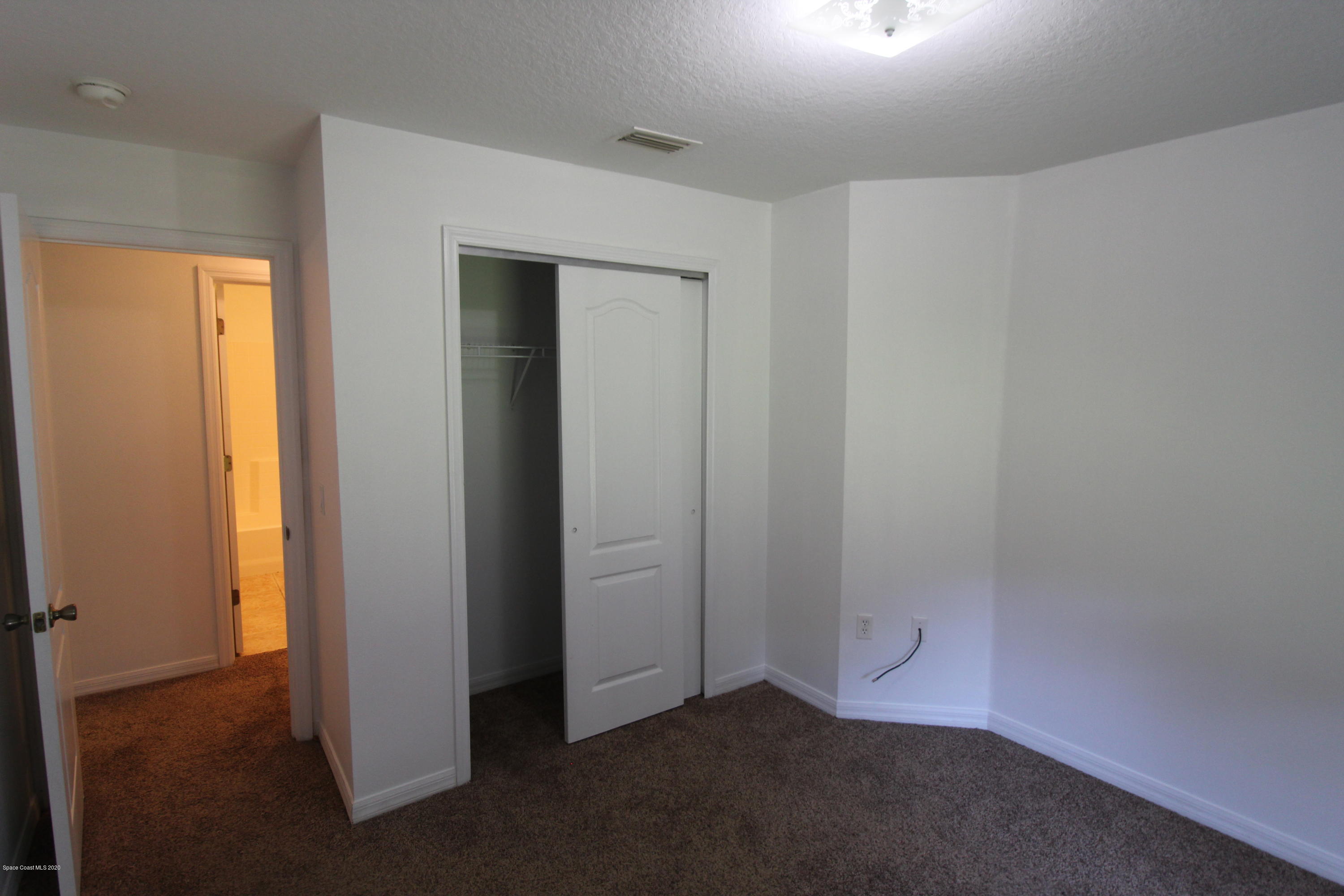 2004 Gloria Circle Palm Bay, FL 32905 - Photo 24 of 36 an empty room with closet