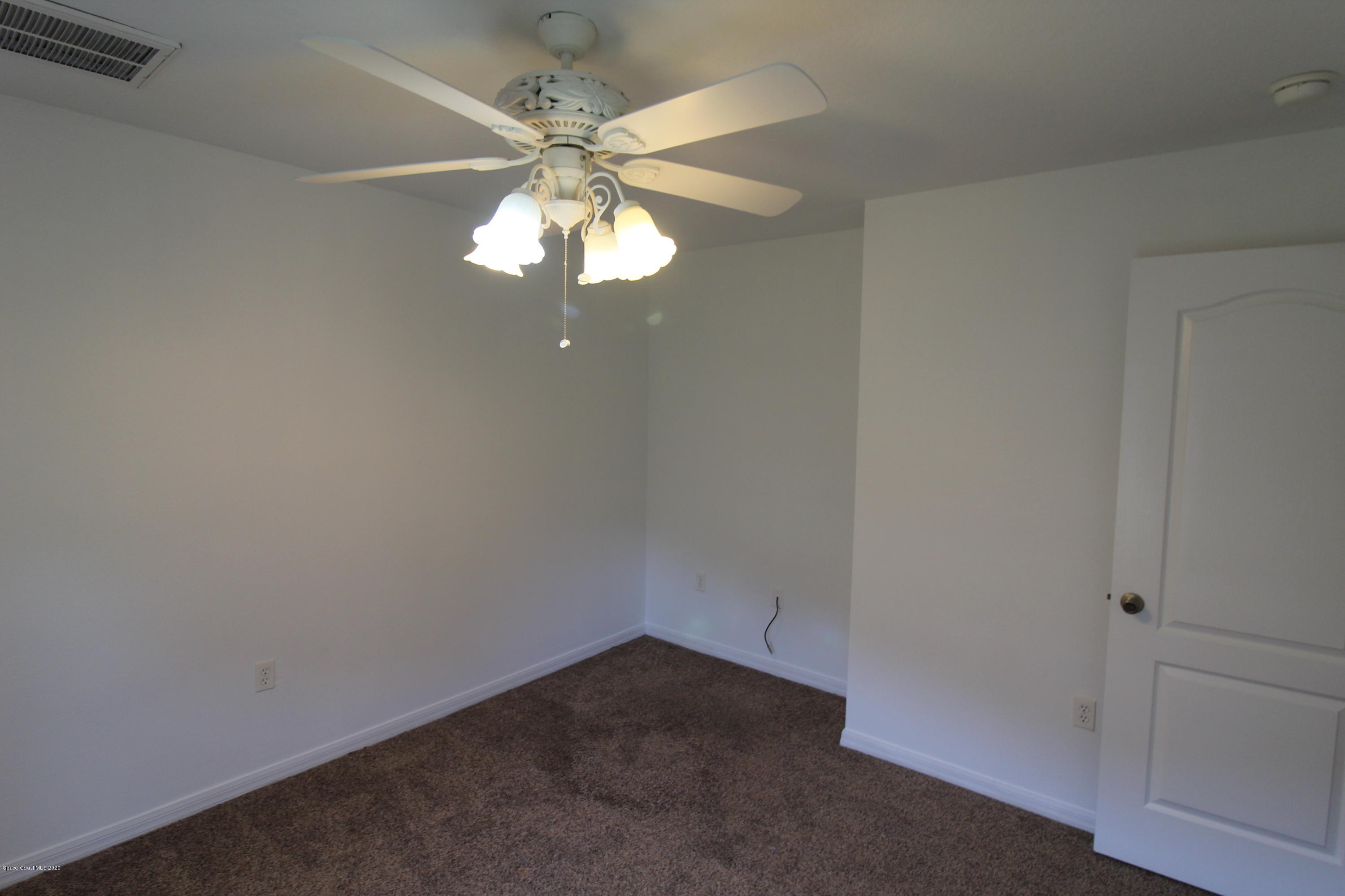 2004 Gloria Circle Palm Bay, FL 32905 - Photo 26 of 36 en empty room with a window