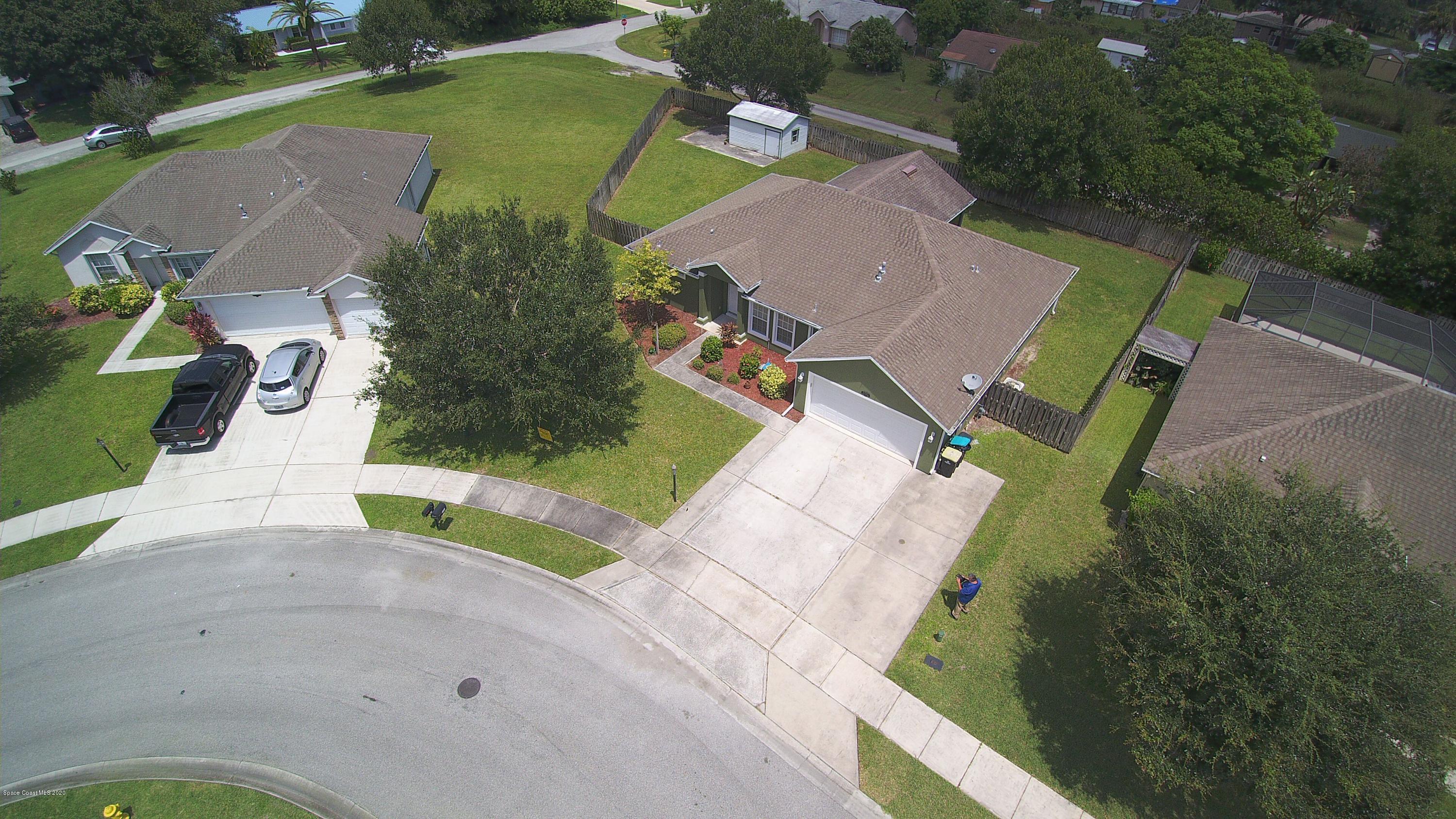 2004 Gloria Circle Palm Bay, FL 32905 - Photo 35 of 36 an aerial view of a house
