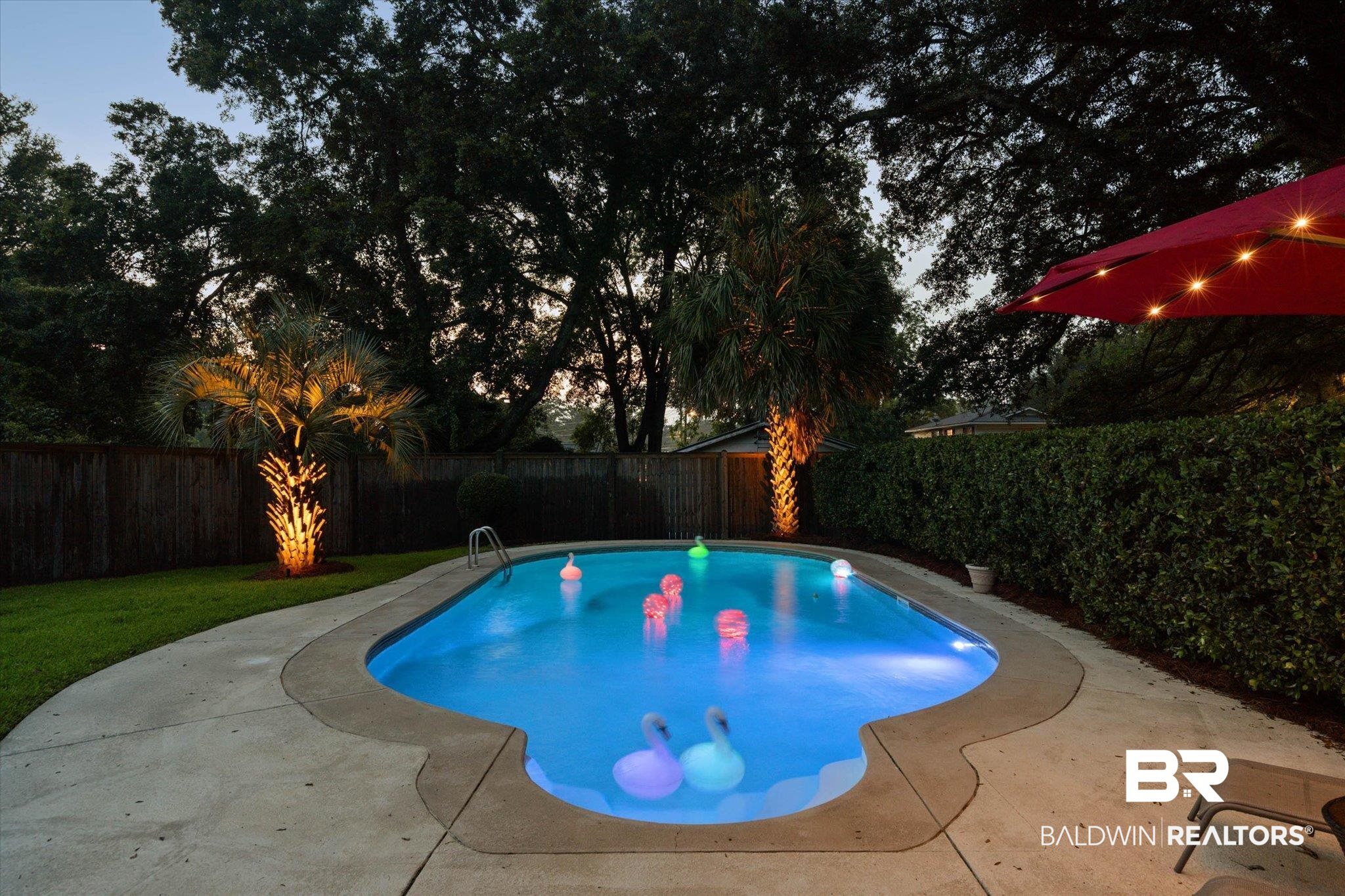 101 Ann Street Daphne, AL 36527 - Photo 37 of 38 Inviting backyard swimming pool featuring a concrete surround and integrated steps