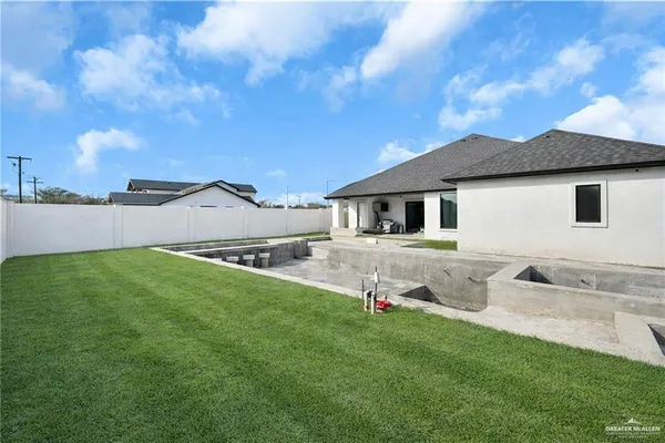 a view of living room filled with furniture and rug floor