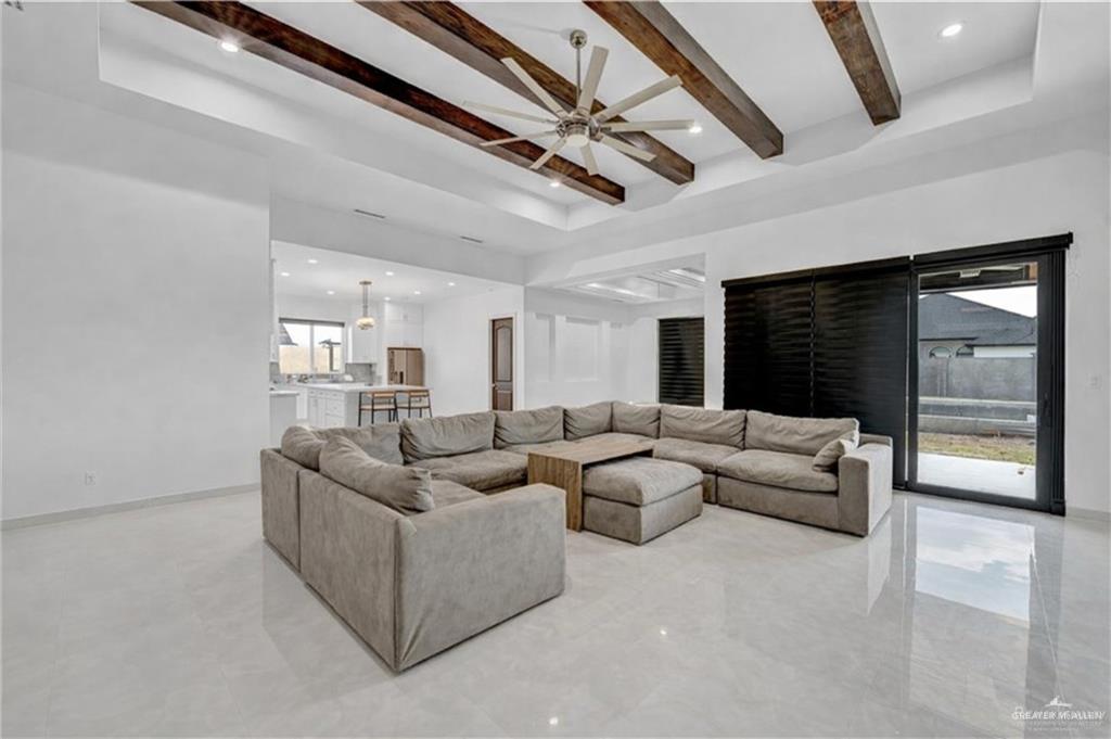 1105 Wesley Street Pharr, TX 78577 - Photo 6 of 17 a living room with furniture and a ceiling fan